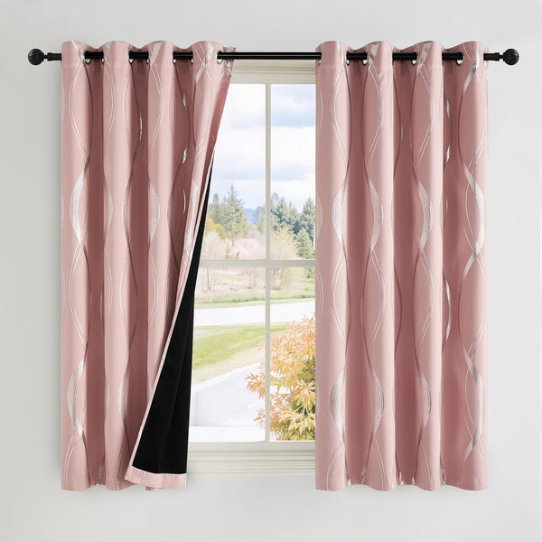 Modern pink curtains with silver wave design and grommet top, showing blackout lining.