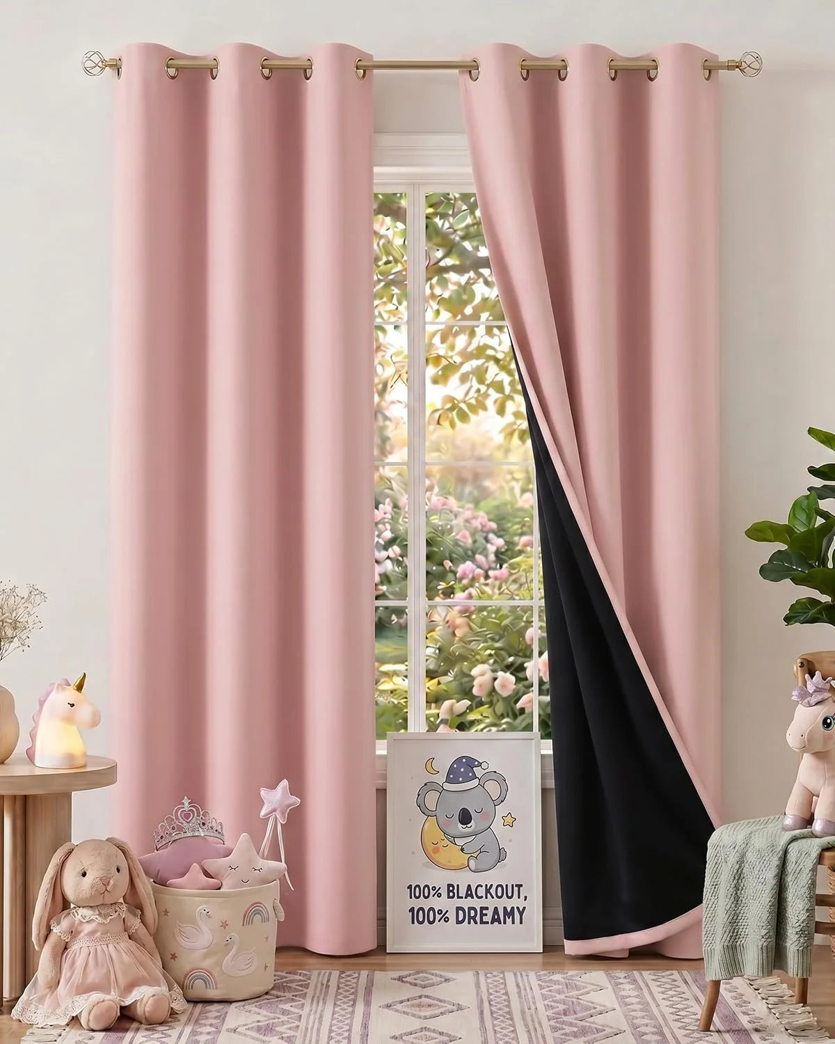 Rose pink blackout curtains with brass grommets hung in a child's bedroom setting.