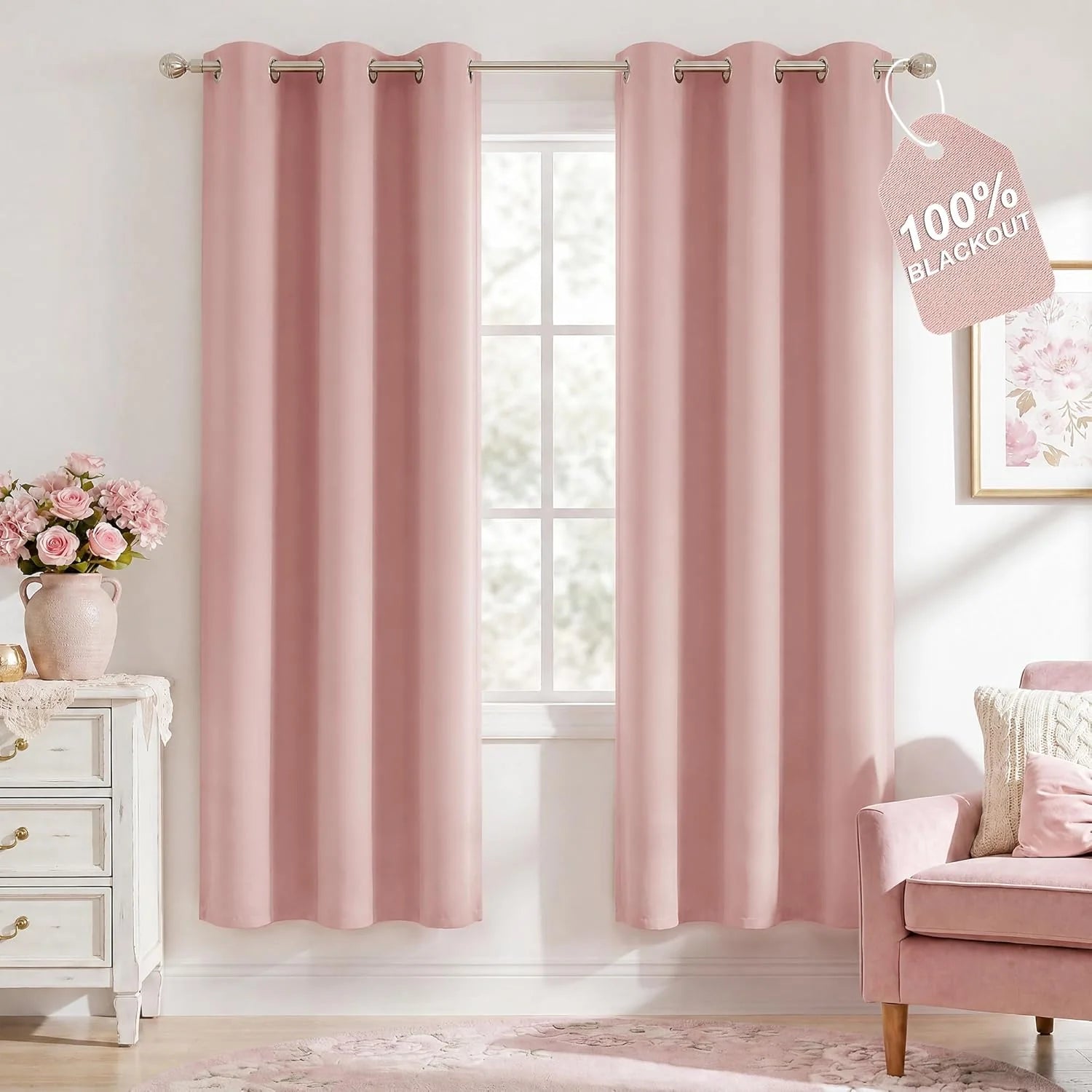 Light pink blackout curtains with silver grommets in a bedroom, featuring a white dresser and pink armchair.