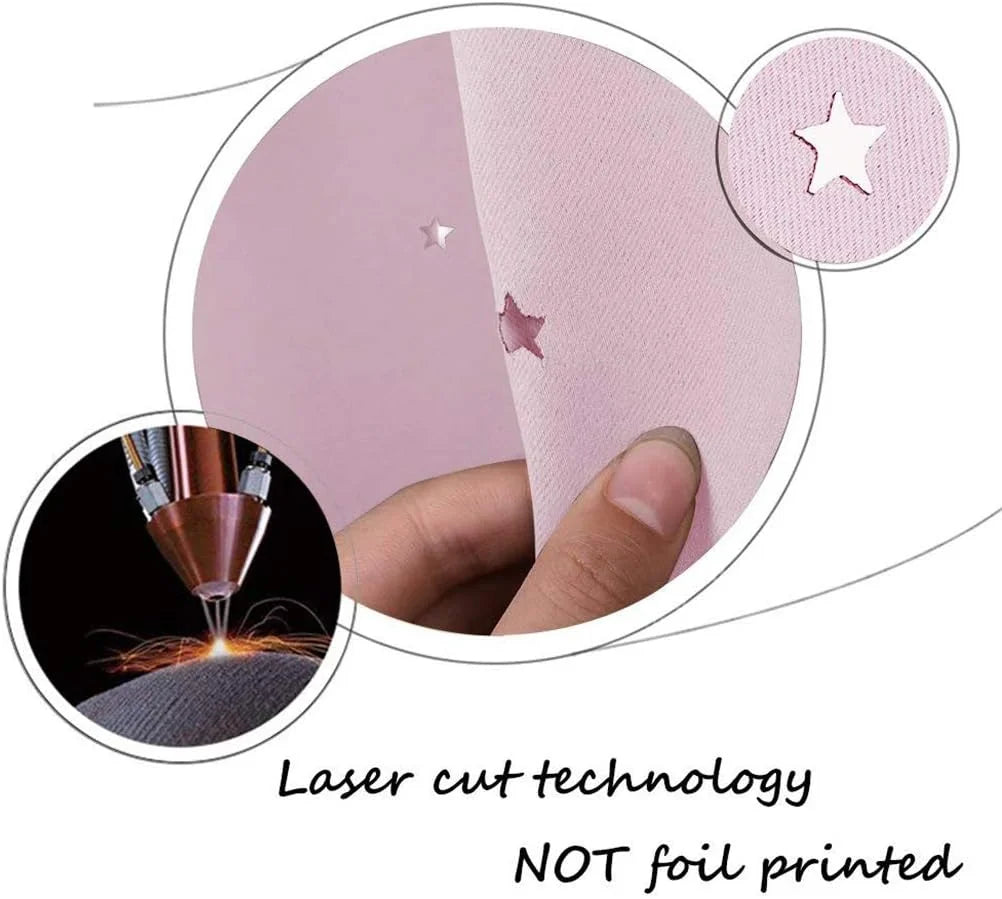 Hand holding pink fabric with laser cut star detail and close-up material texture