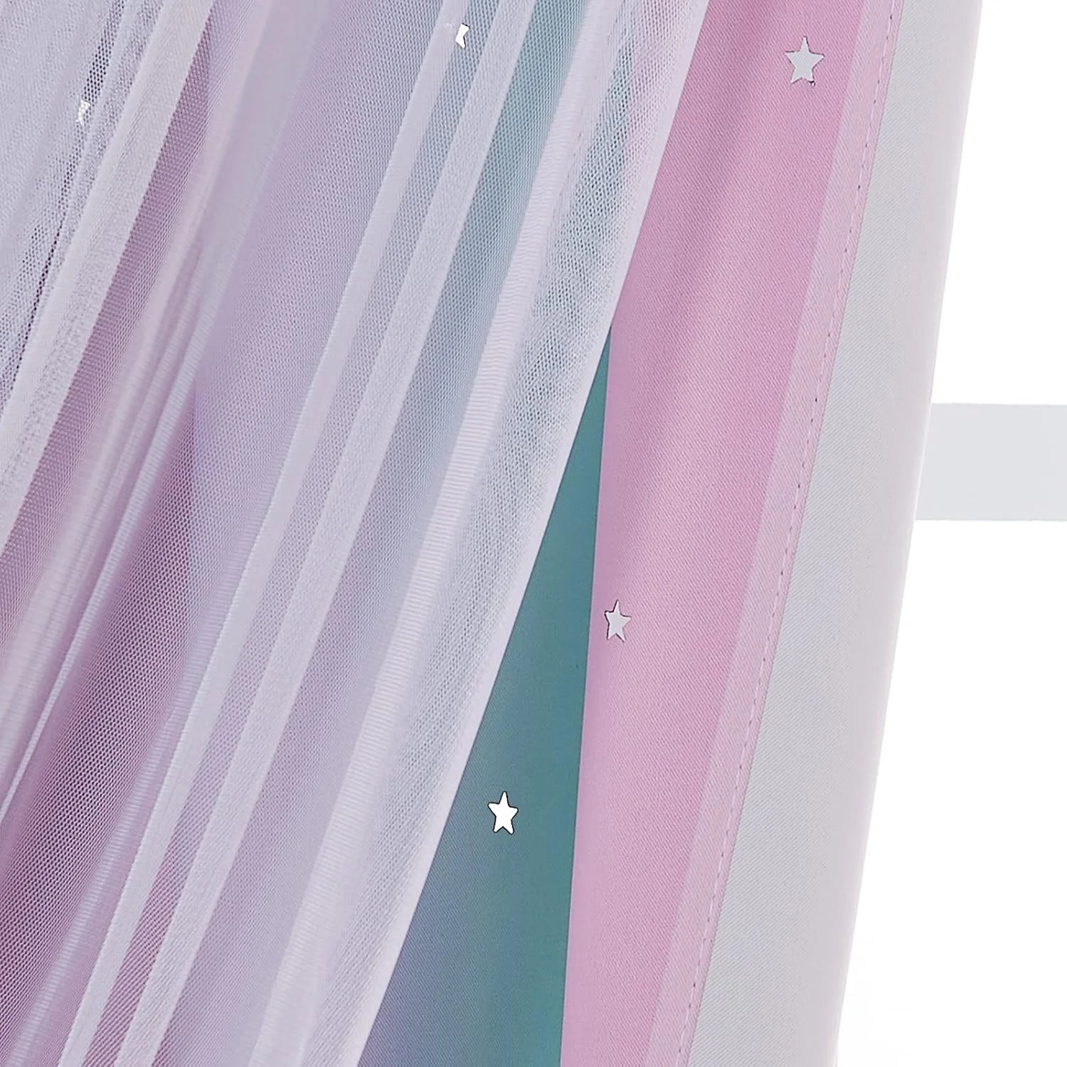 Pink sheer curtain with white tulle overlay and star details for a kids room