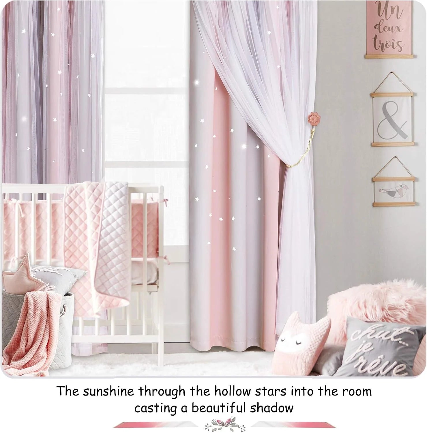 Pink sheer star curtains layered over blush drapes in a soft nursery room