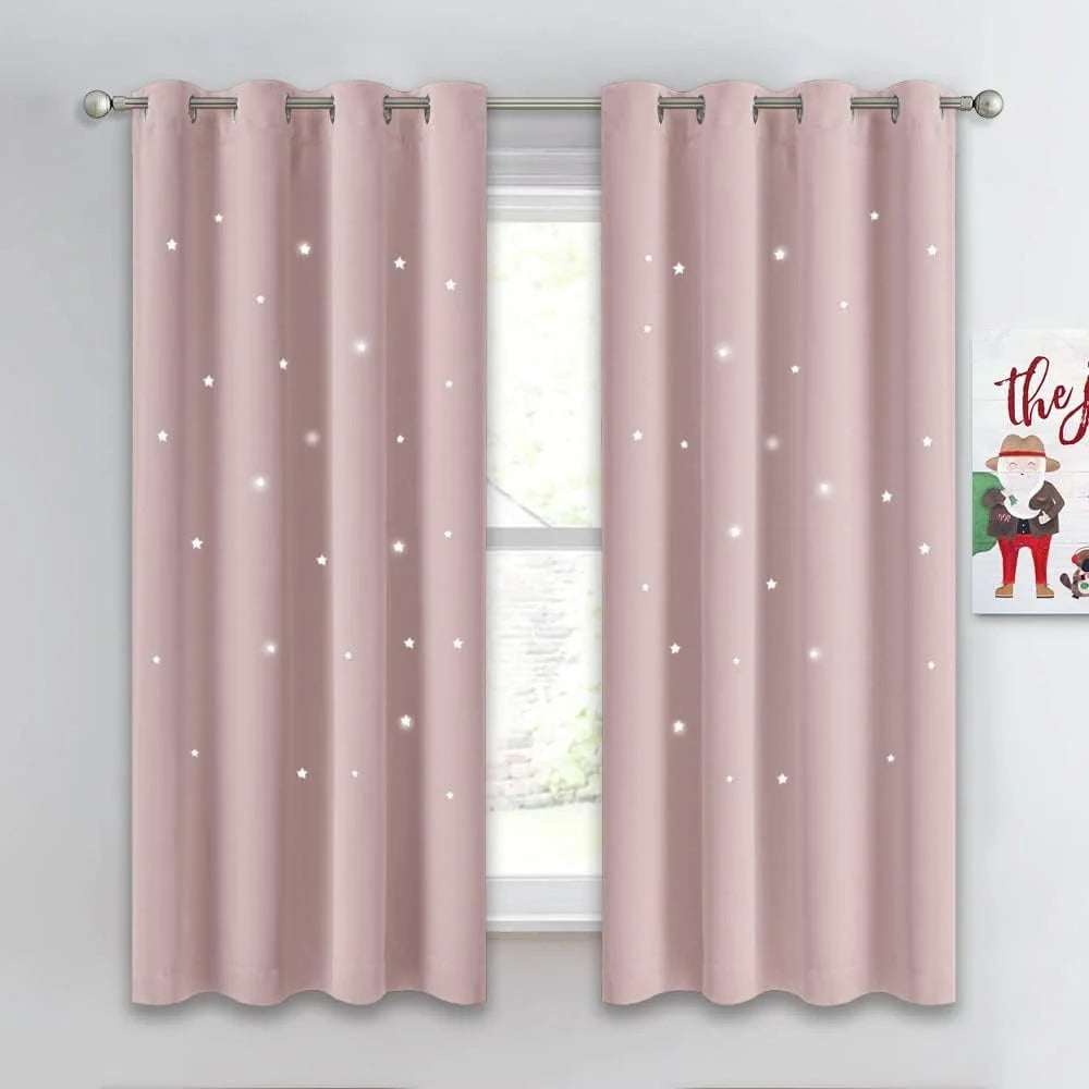 Blush pink blackout curtains with glowing star pattern and silver grommet top