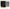Soft black Plylux physical blackout curtain fabric compared to rough gray chemical blackout coated material.
