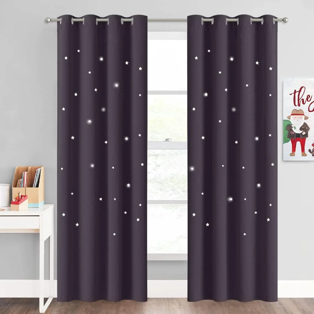 Dark purple star print curtains with silver grommets in a kids room window