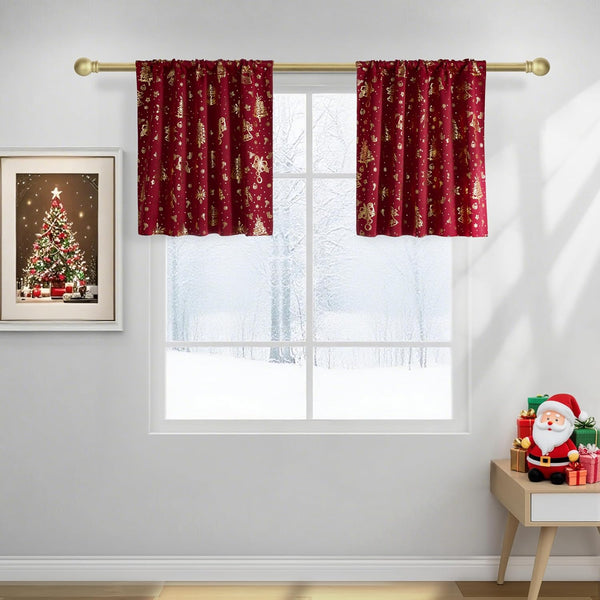 Two red valance curtains with shimmering gold Christmas trees, snowflakes, and bells hanging on a gold rod.