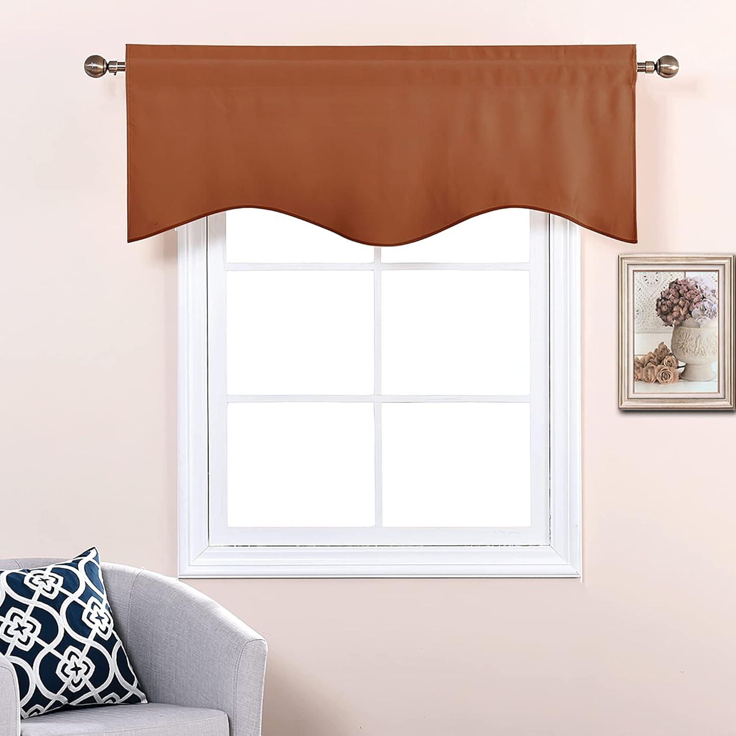 Reddish-brown rod pocket valance with a decorative wavy scalloped bottom edge installed on a window.