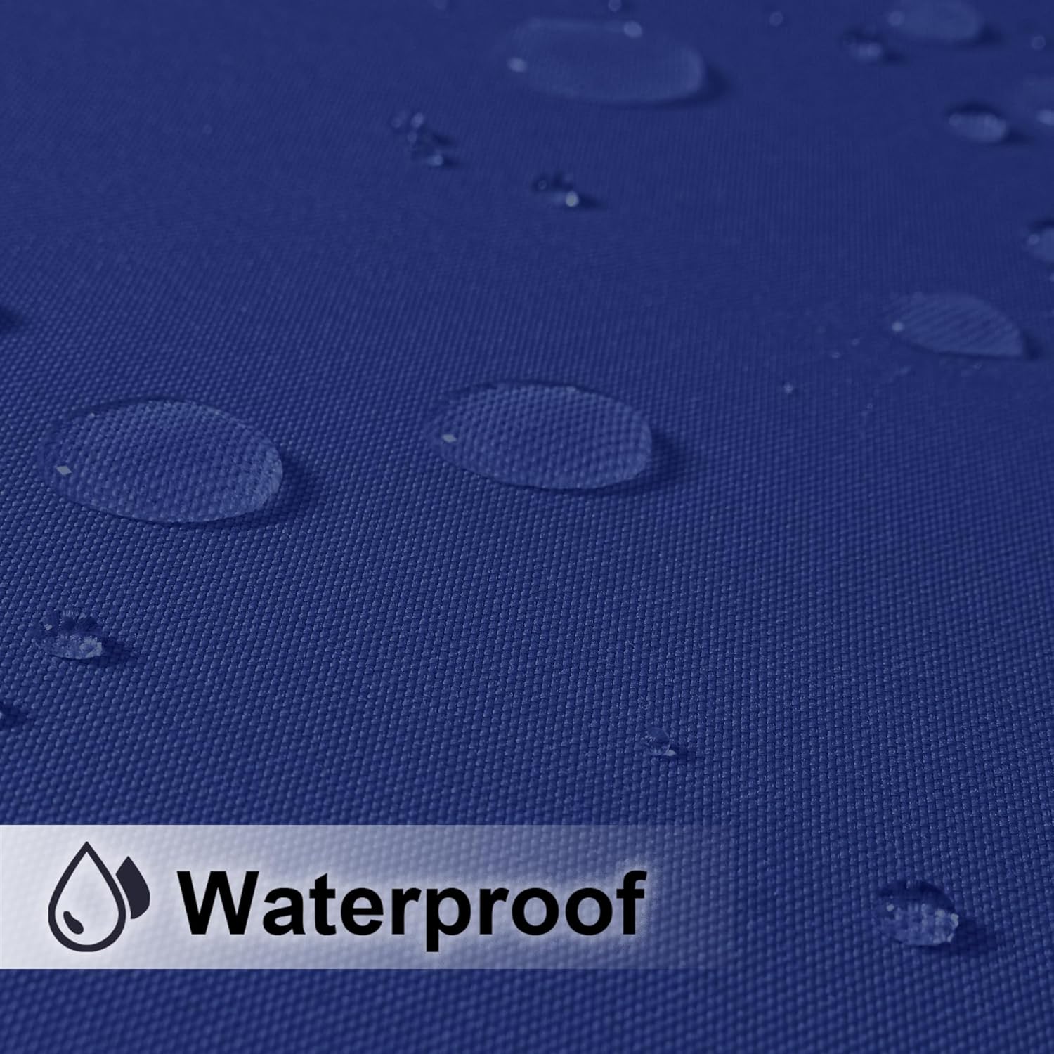 Close-up of royal blue woven fabric with water droplets beading, showcasing its waterproof quality.