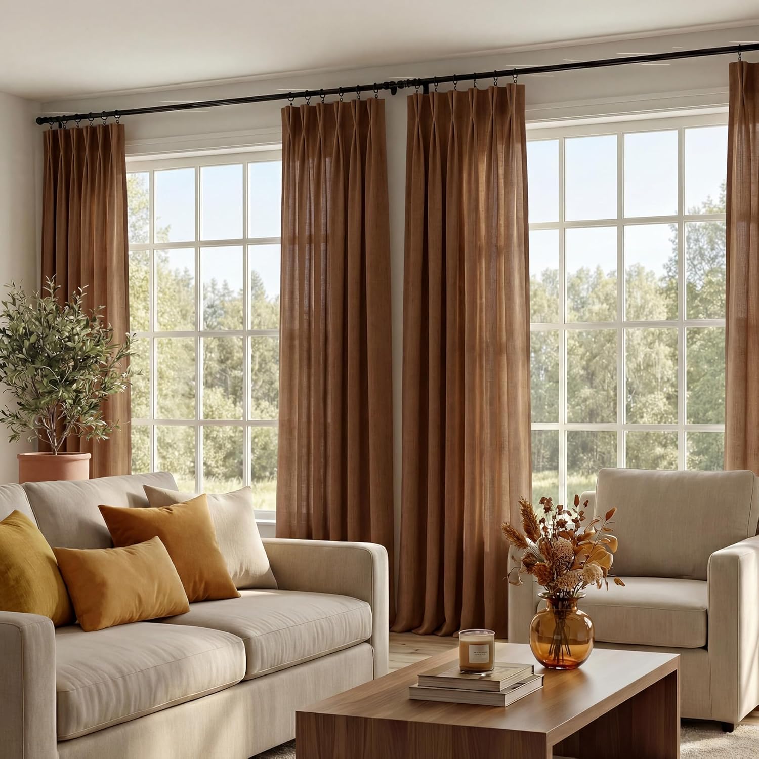 Rust brown linen blend pleated curtains with rings on a black rod, framing bright windows in a living room.