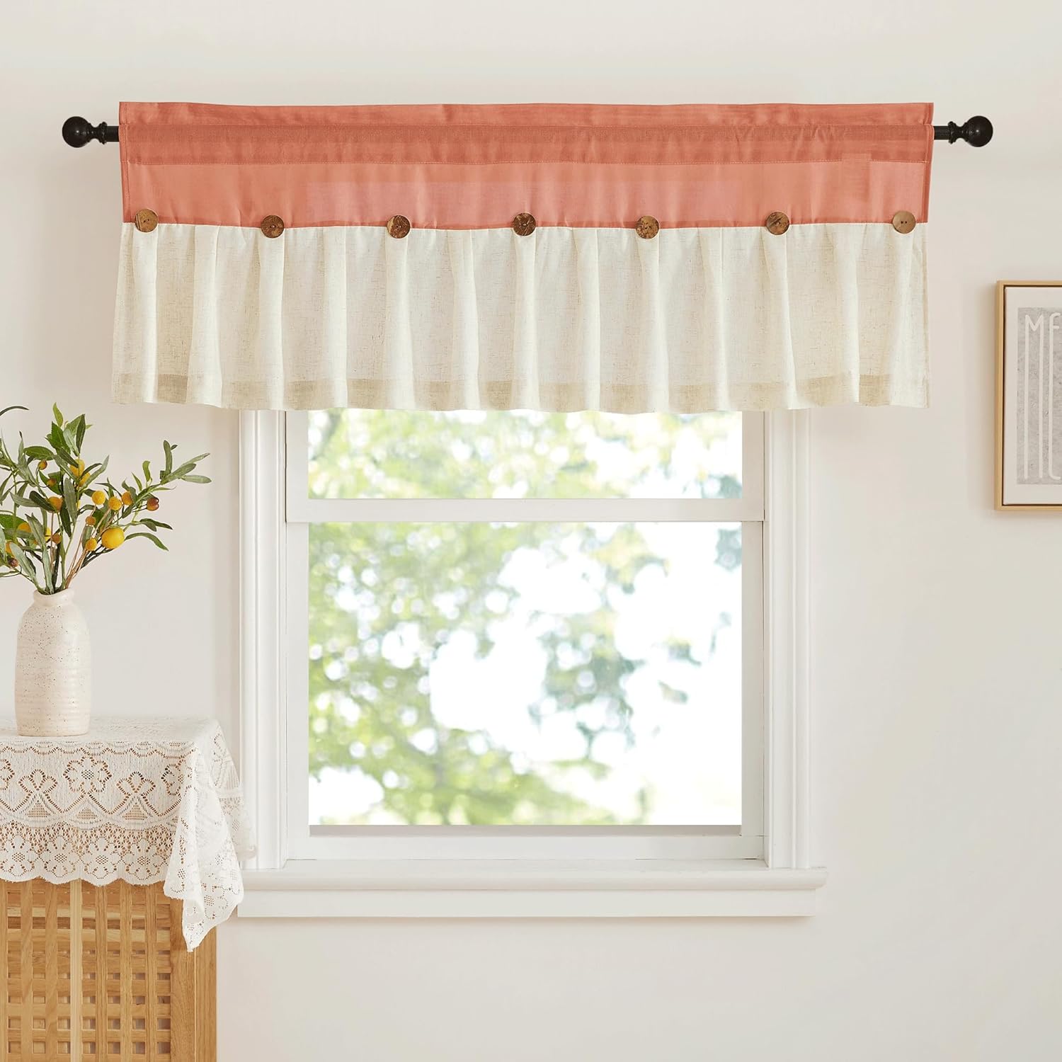 Rust and cream two-tone linen blend valance with decorative wooden buttons hanging over a window.