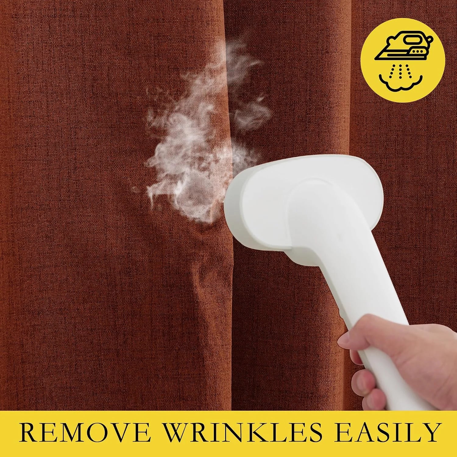 Handheld steamer removing wrinkles from rust brown textured curtain fabric