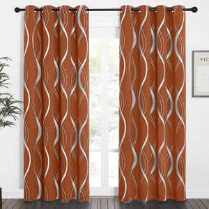 Pair of rust orange curtains with metallic silver wavy pattern and grommet top, enhancing a modern window.
