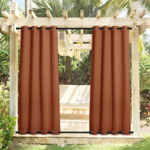 Rust outdoor privacy curtains with black grommets on wooden pergola. Bottom rod visible.