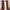 Rust textured window curtains with grey blackout lining hanging from a wooden rod.
