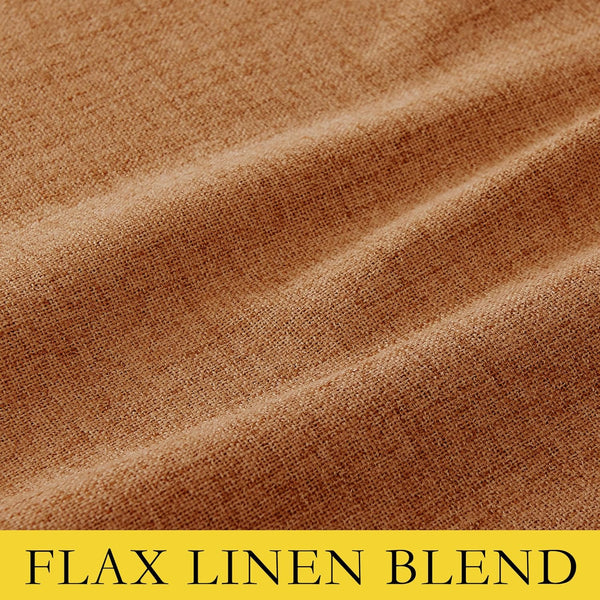 Close-up of a rust-colored, visibly textured flax linen blend fabric with a coarse weave and soft folds.