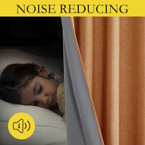 Rust textured noise reducing curtain with grey thermal lining, ensuring peaceful sleep for a child.