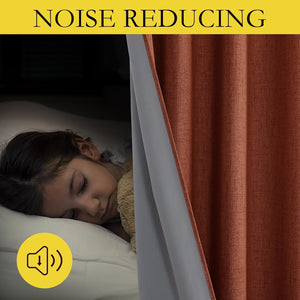 Rust textured noise-reducing lined curtains, revealing grey backing. Child sleeps peacefully in dark room.