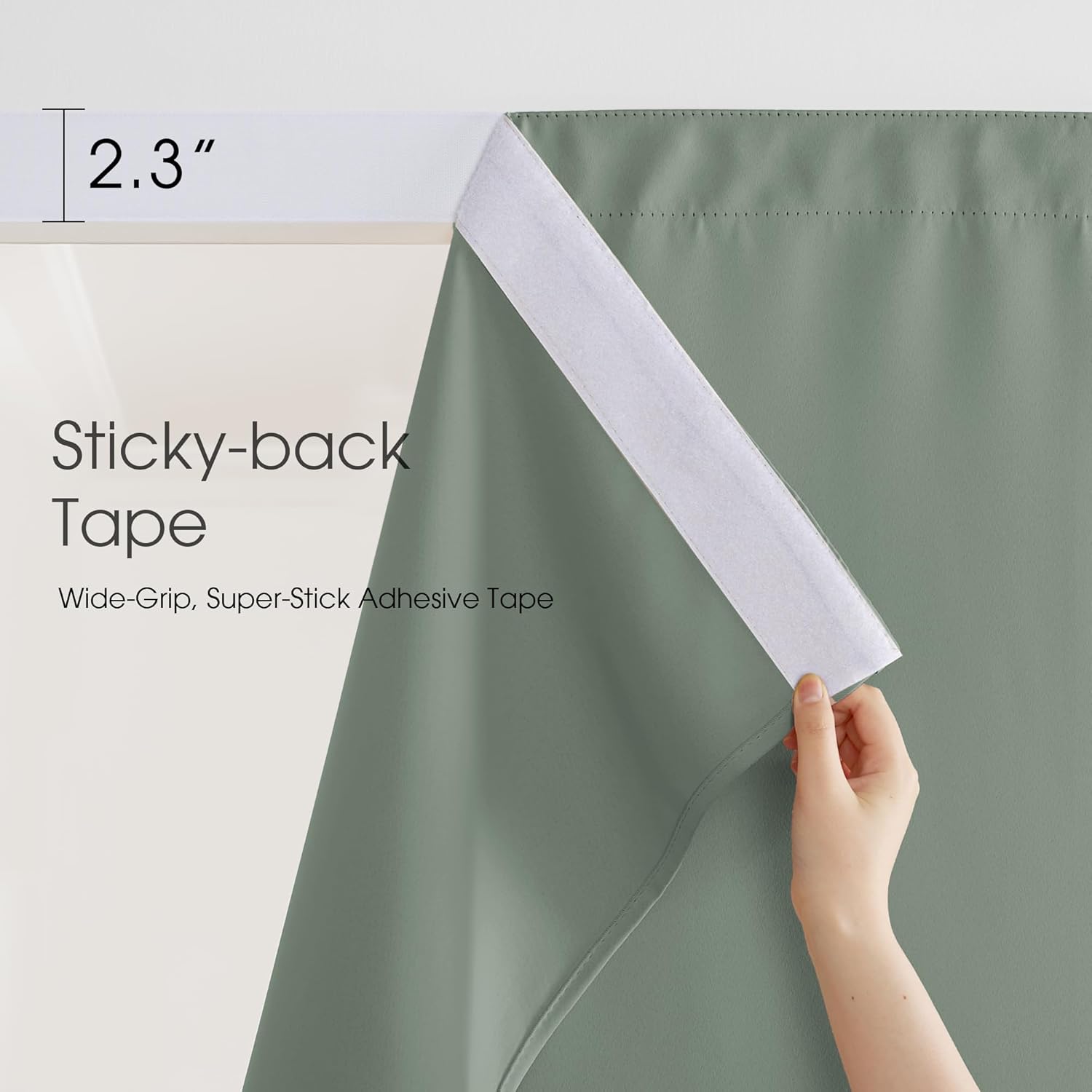Hand demonstrates 2.3-inch sticky-back adhesive tape on a sage green curtain panel.