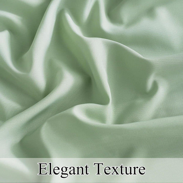 Soft, elegant sage green fabric displaying subtle sheen and delicate drapes, highlighting its smooth texture.