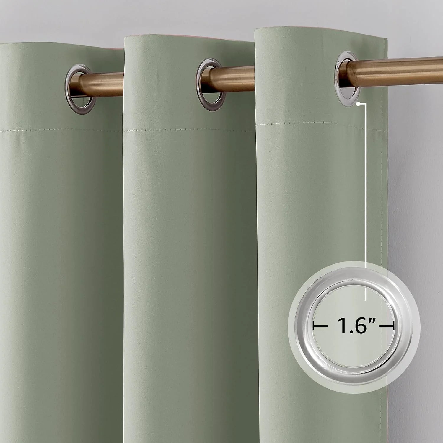 Sage green grommet curtain close-up showing 1.6-inch ring diameter.