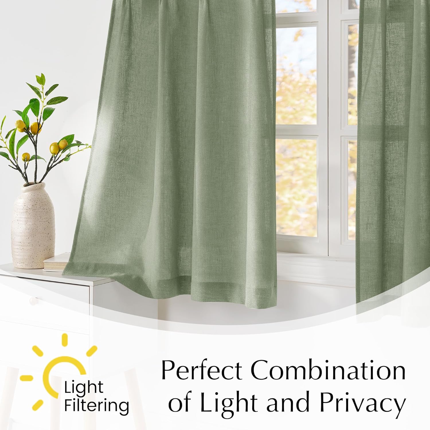 Textured sage green linen-blend curtains hanging on a window, softly filtering light and offering privacy.