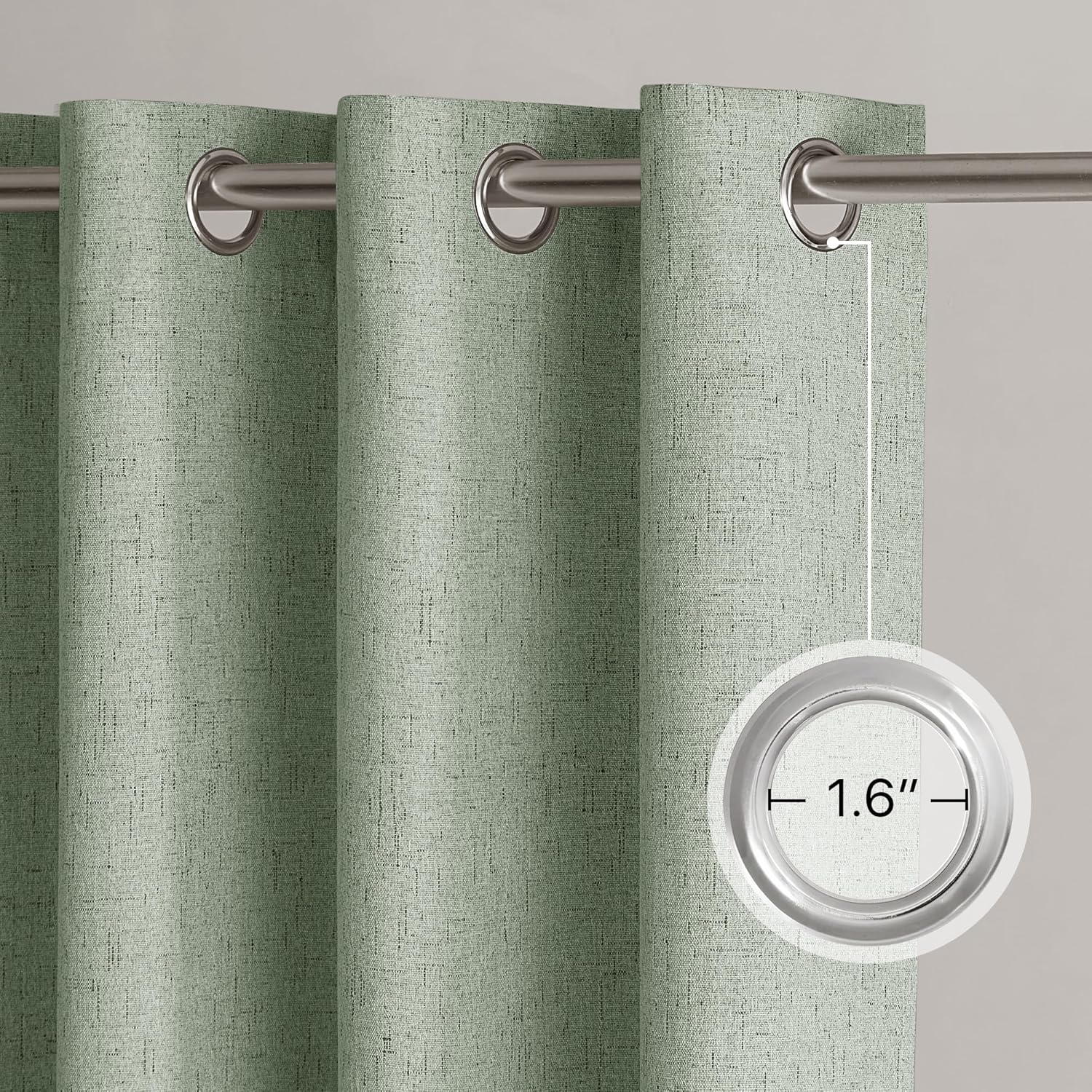 Close-up of sage green textured linen-look grommet curtains on a silver rod, highlighting the 1.6-inch grommet diameter.