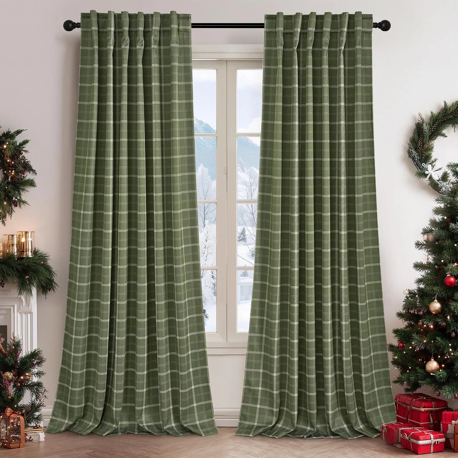 Sage green plaid curtains on a black rod in a festive living room window