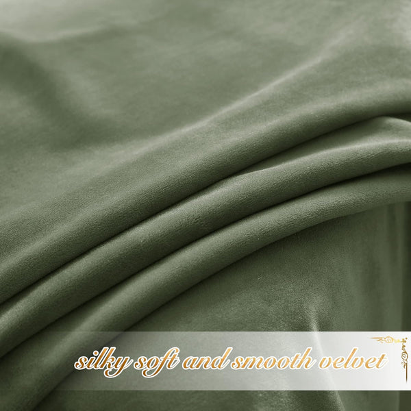Close-up of a luxurious sage green velvet fabric, showcasing its silky soft texture and elegant drapes.