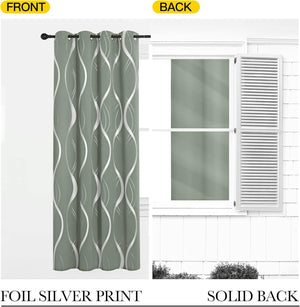 Sage green grommet curtain with silver foil wave print, displaying its solid blackout back.