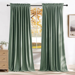 Soft sage green velvet rod pocket curtains on black rod, framing window with autumn scene.