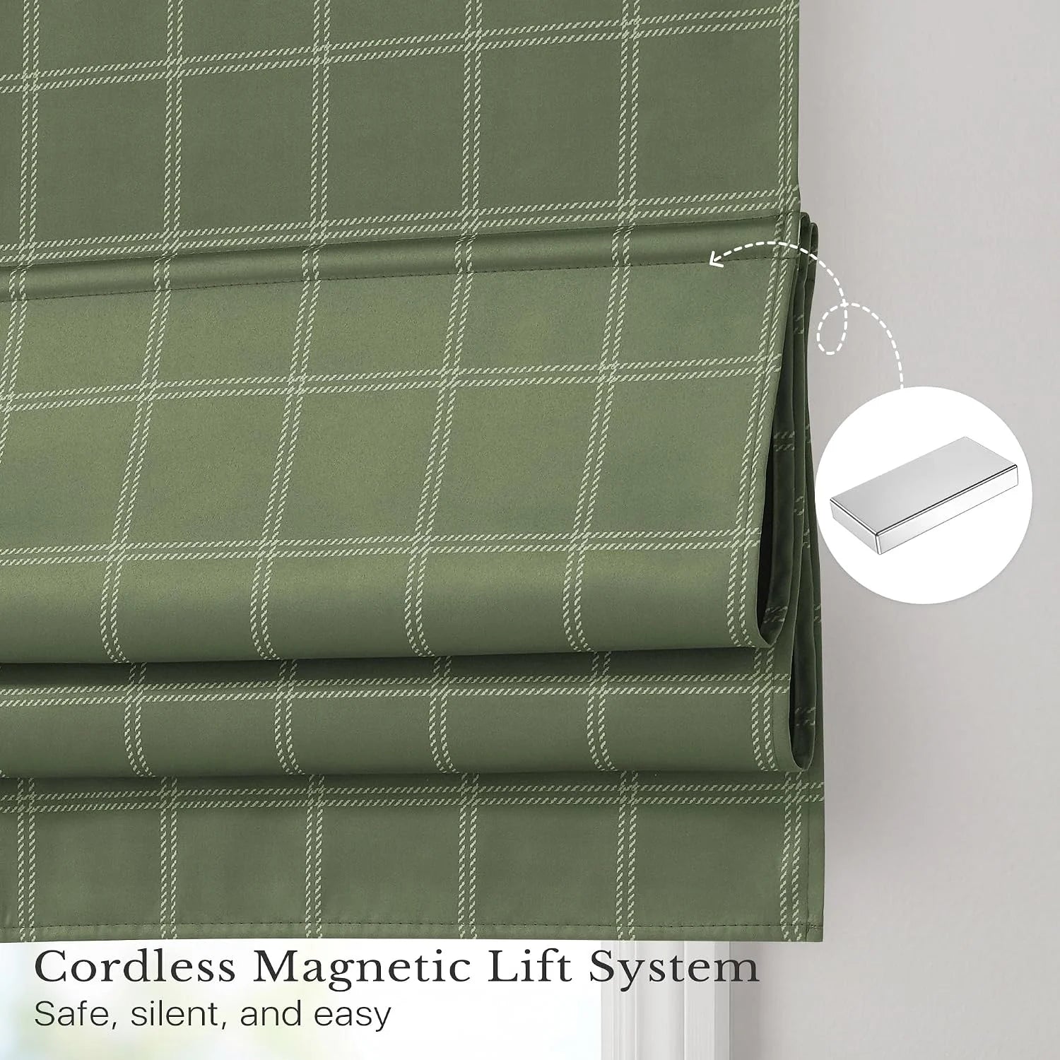 Sage green plaid Roman shade with cordless magnetic lift system detail