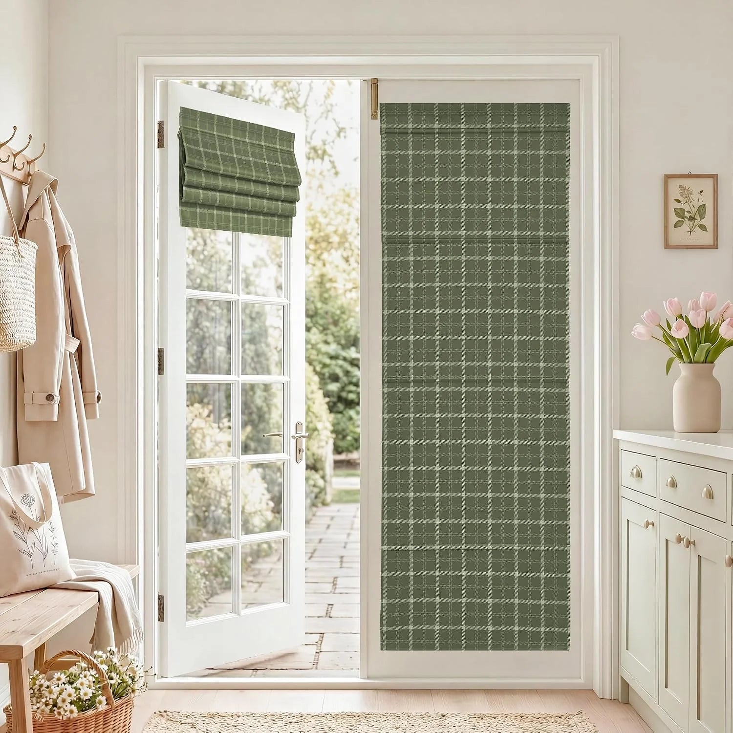 Sage green plaid Roman shade covering a glass patio door in a bright entryway
