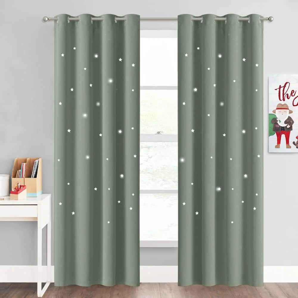 Sage green blackout curtains with glowing star cutouts and silver grommets