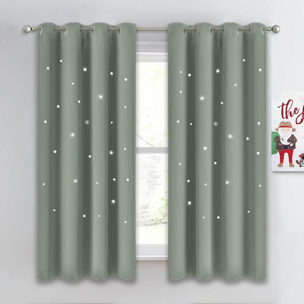 Sage green blackout curtains with glowing star cutouts and silver grommet top