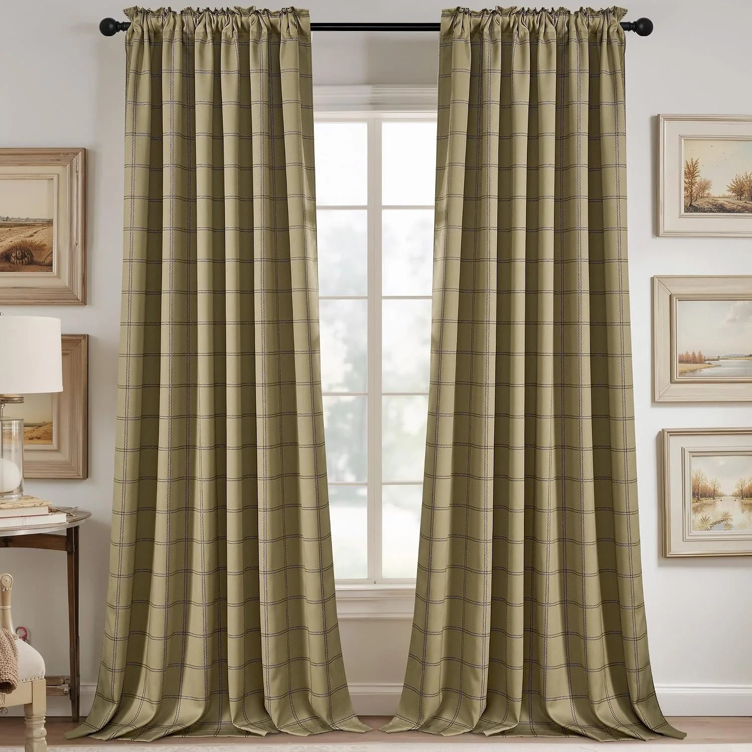 Sage green windowpane plaid curtains on a black rod in a warm traditional room
