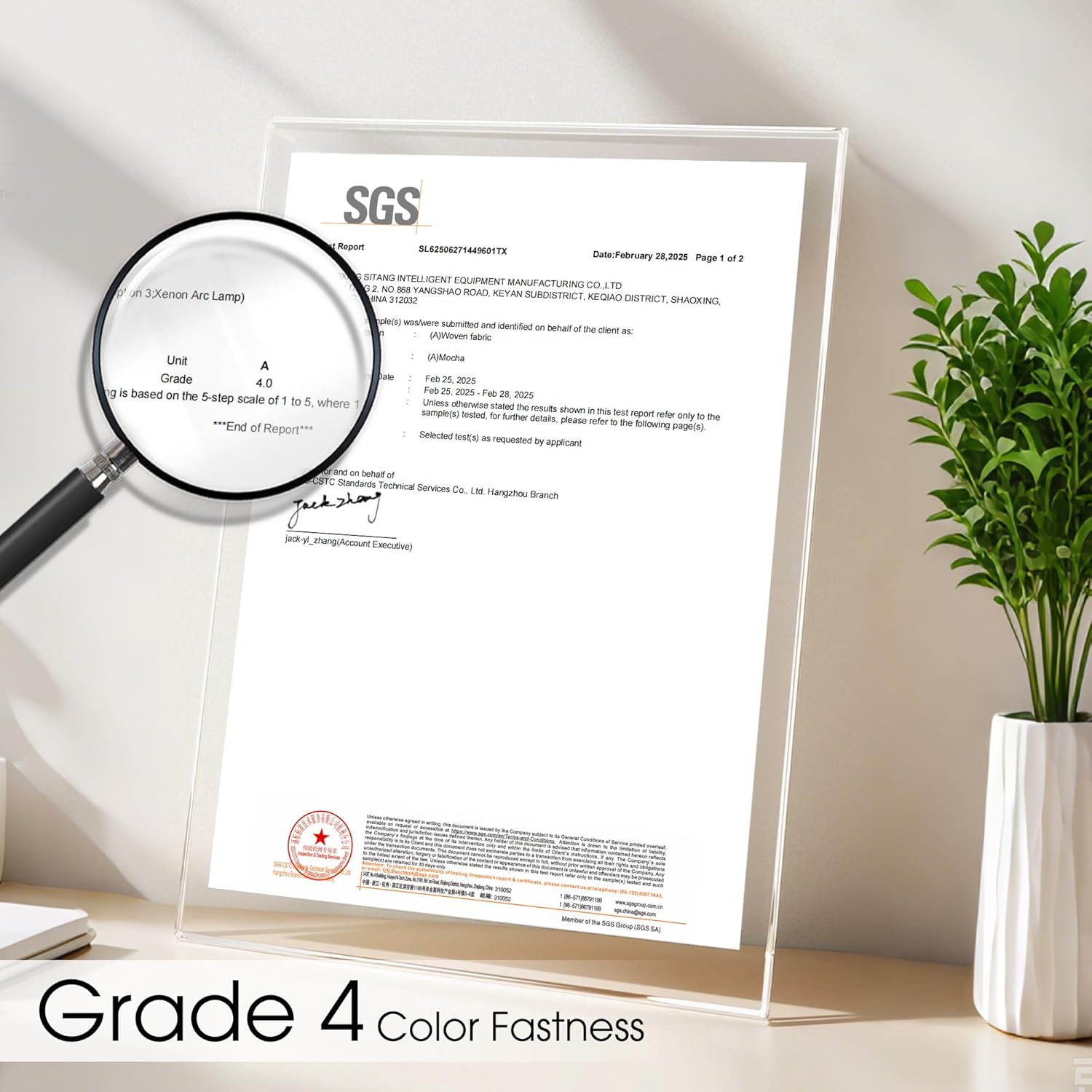 Close-up of SGS report in clear acrylic holder, showing 'Grade 4.0' for woven fabric color fastness.