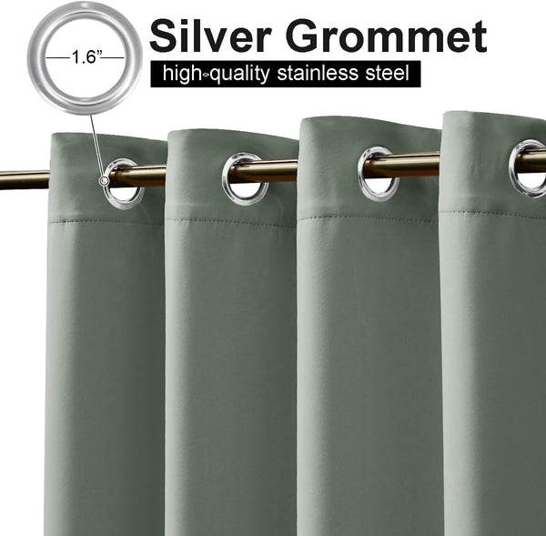 Close-up of sage green blackout curtains with silver grommets on a golden rod