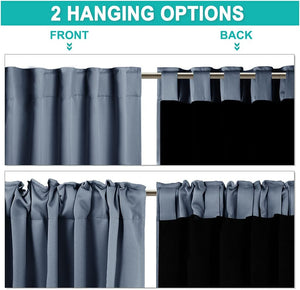 Slate blue blackout curtains with rod pocket and back tab hanging. Blackout lining visible.