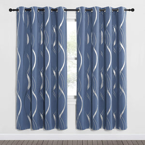 Pair of slate blue curtain panels featuring silver wavy print and grommet tops.