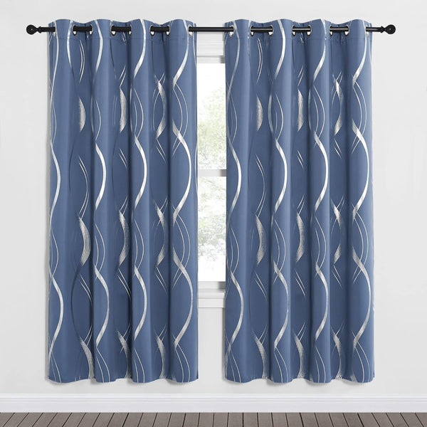 Pair of slate blue curtain panels featuring silver wavy print and grommet tops.