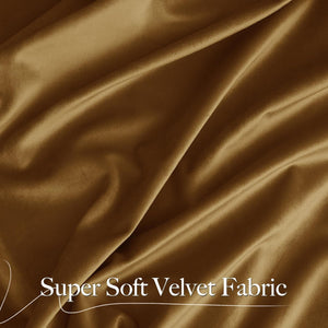 Detailed close-up of soft mustard velvet fabric, highlighting its luxurious texture and elegant folds.