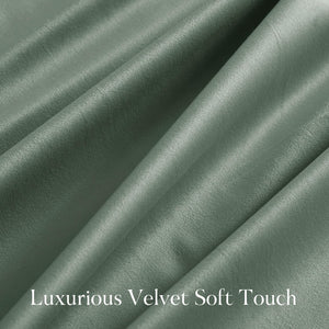 Detailed close-up of a luxurious sage green velvet fabric, highlighting its soft touch and rich, draped texture.