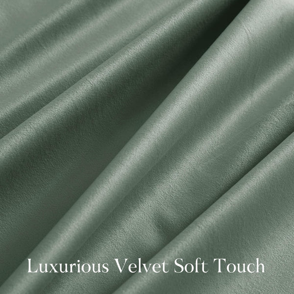 Detailed close-up of a luxurious sage green velvet fabric, highlighting its soft touch and rich, draped texture.