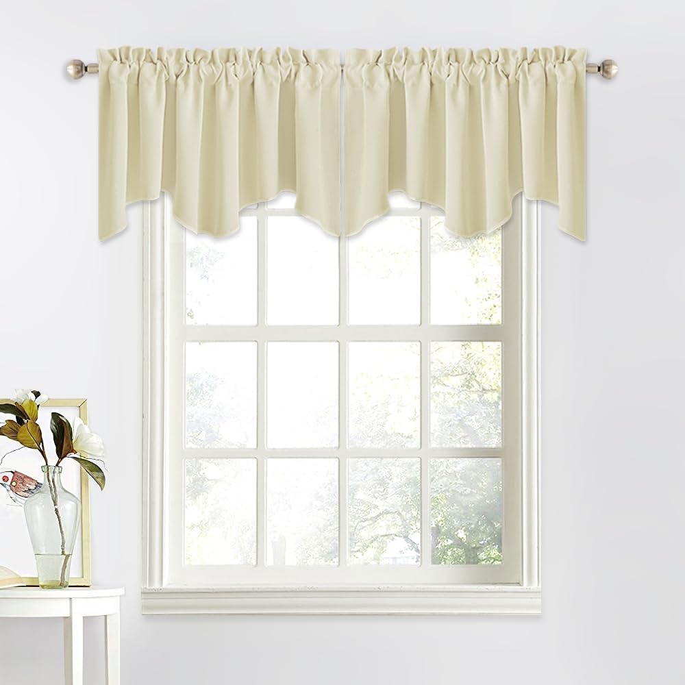 Cream solid window valance featuring a gathered rod pocket top and decorative scalloped hem.