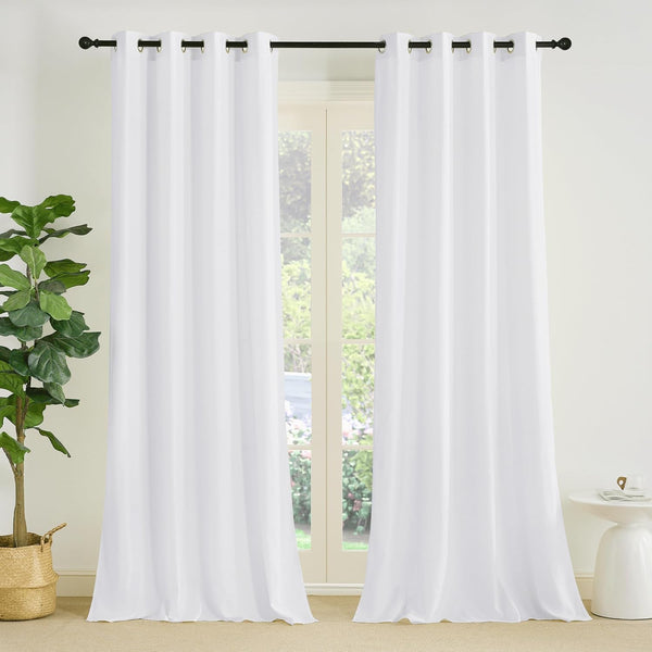 Pair of solid white window curtains with silver-tone metal grommets on a black rod.
