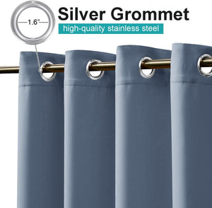 Close-up of steel blue curtain panels with 1.6-inch silver stainless steel grommets on a gold rod.