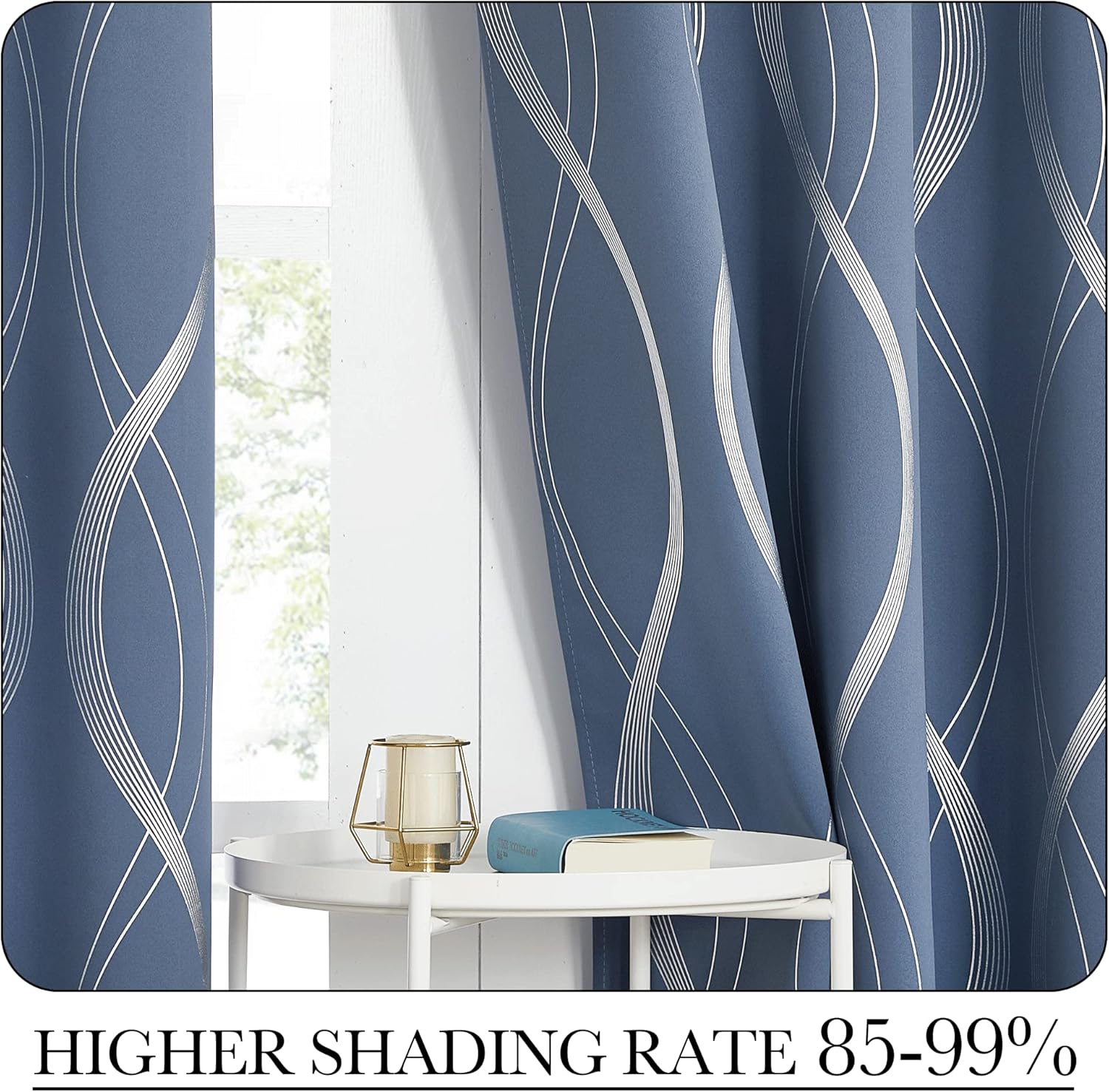 Steel blue blackout curtains with flowing silver wave pattern hanging by a window