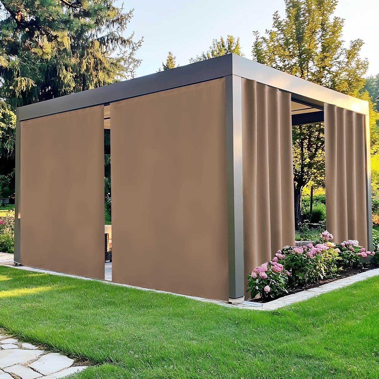 Modern outdoor pergola featuring tan fabric privacy screens on a green lawn with flowers.