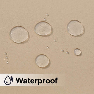 Tan colored fabric with water droplets visibly beading on its waterproof surface.