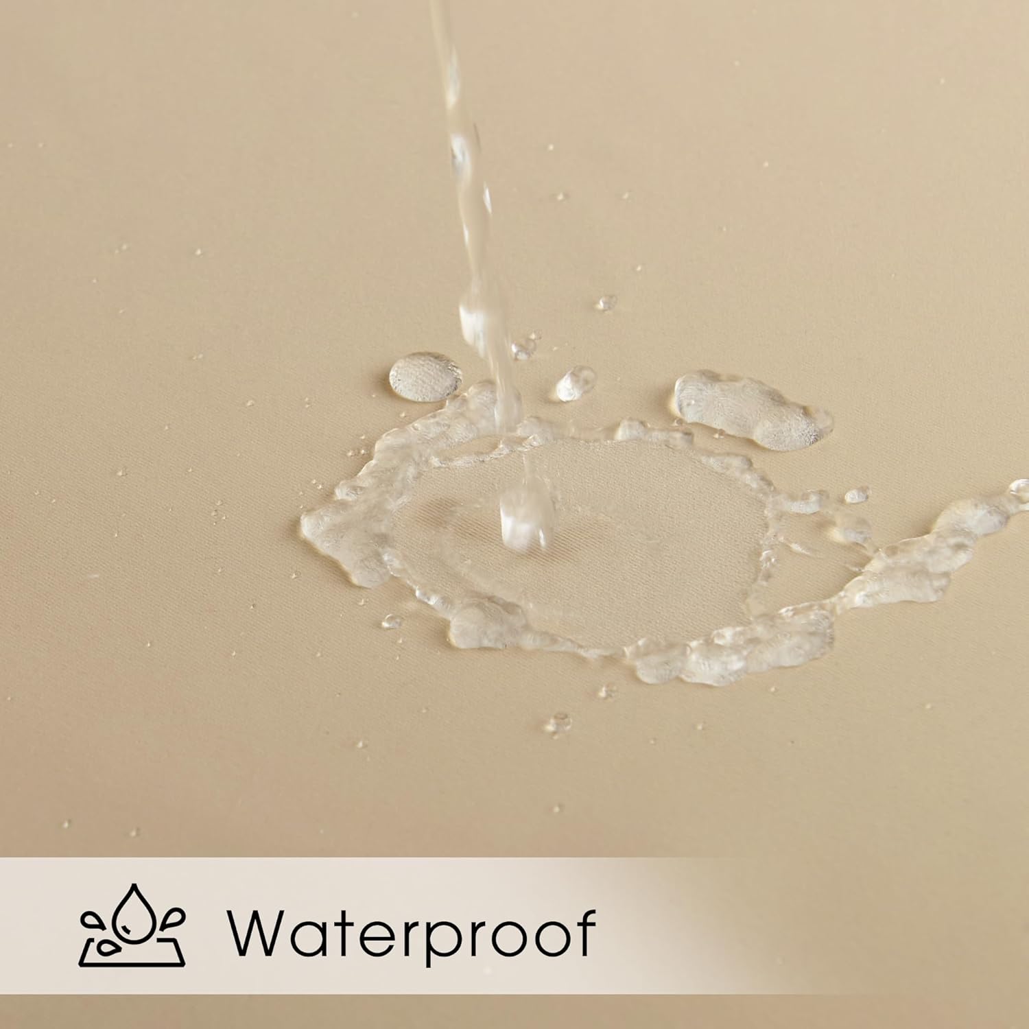 Water streams onto a beige textured fabric, beading up to show its waterproof and spill-resistant quality.